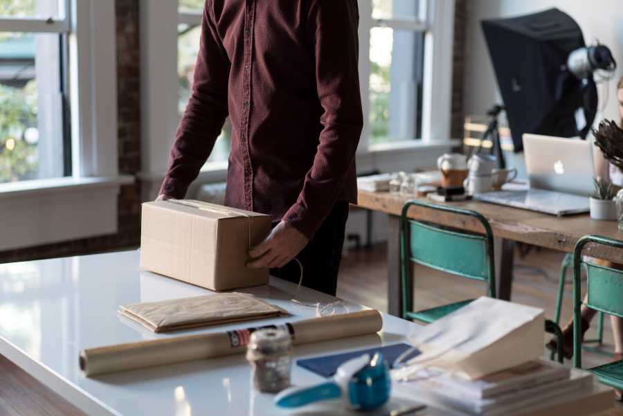 Person preparing a parcel
